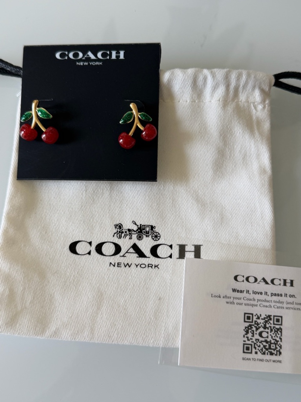 Viral Coach cherry earrings